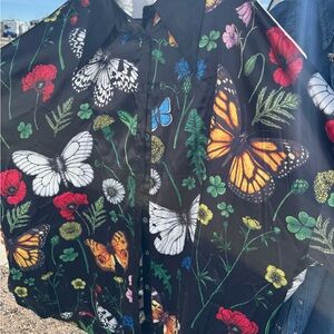 Dressed in LALA Black Shirt with Colorful Floral and Butterfly Design